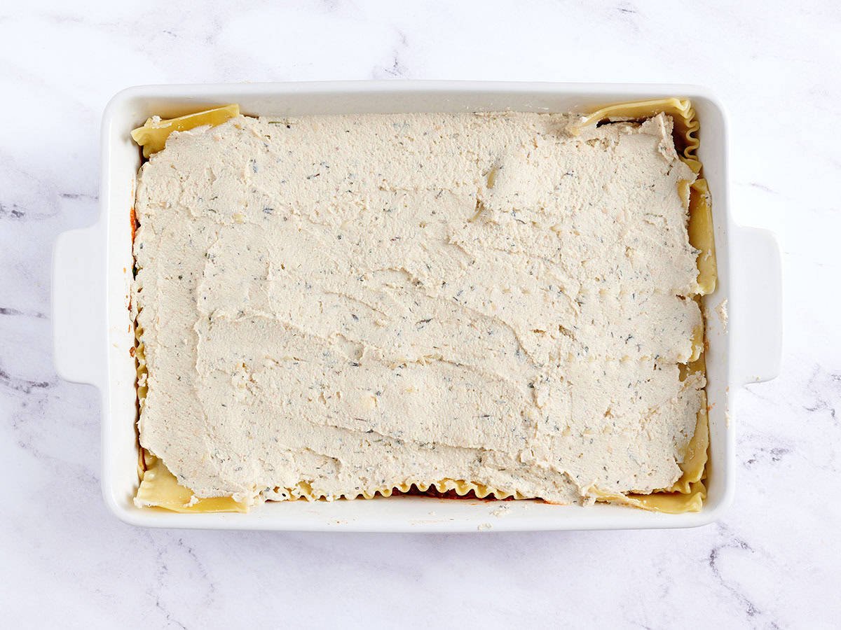 Se agregó una capa de queso tofu y ricotta.